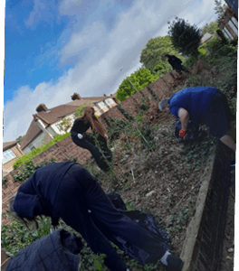 Learners from Break Through School in Belvedere take part in World Clean Up Day, supporting their local community by helping to clear rubbish from Belvedere Baptist Church grounds.