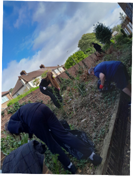 Learners from Break Through School in Belvedere take part in World Clean Up Day, supporting their local community by helping to clear rubbish from Belvedere Baptist Church grounds.